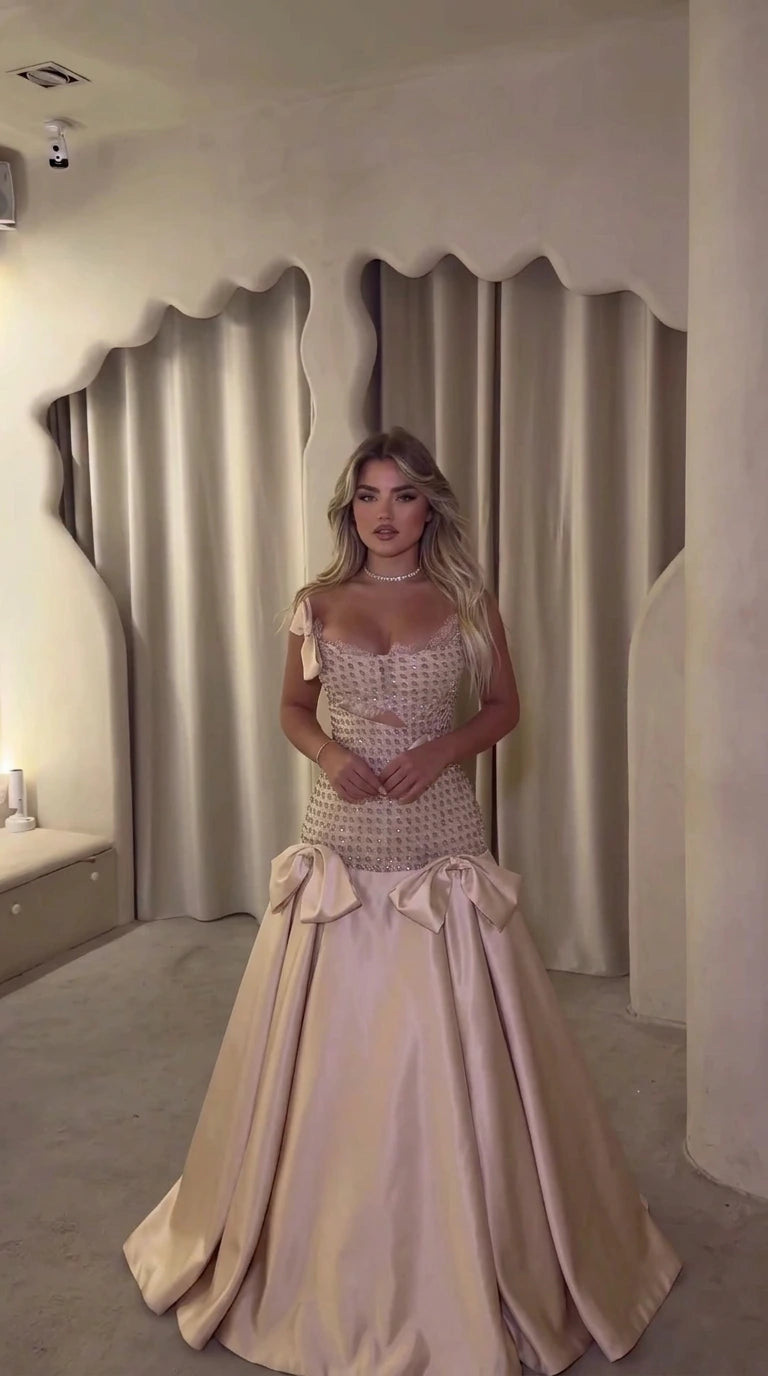 Champagne blush rhinestone drop-waist ball gown on model