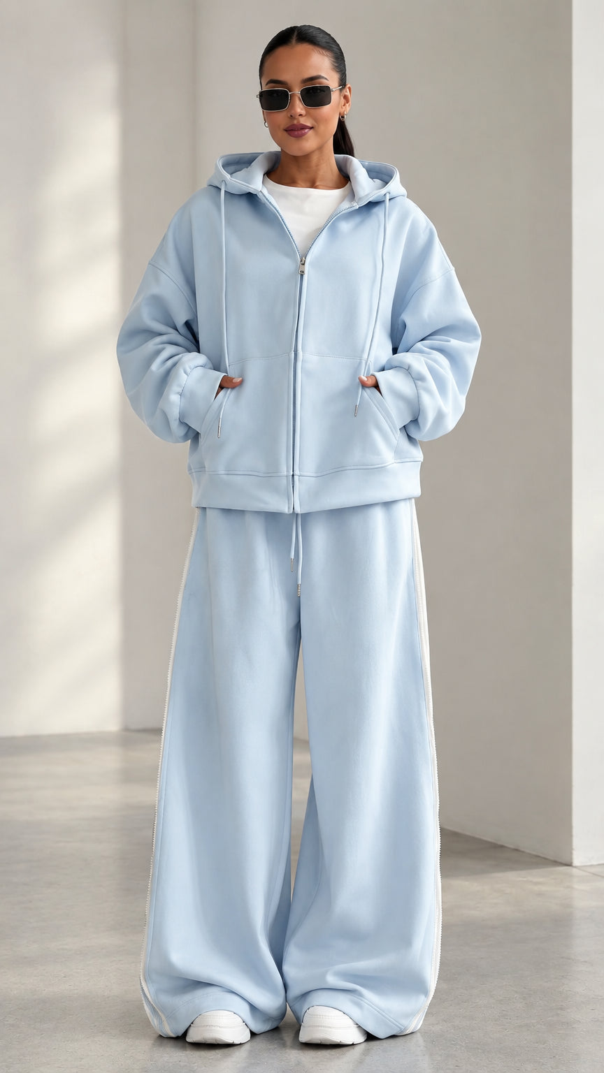 Full front view of model wearing Light Blue oversized zip hoodie and wide-leg sweatpants set