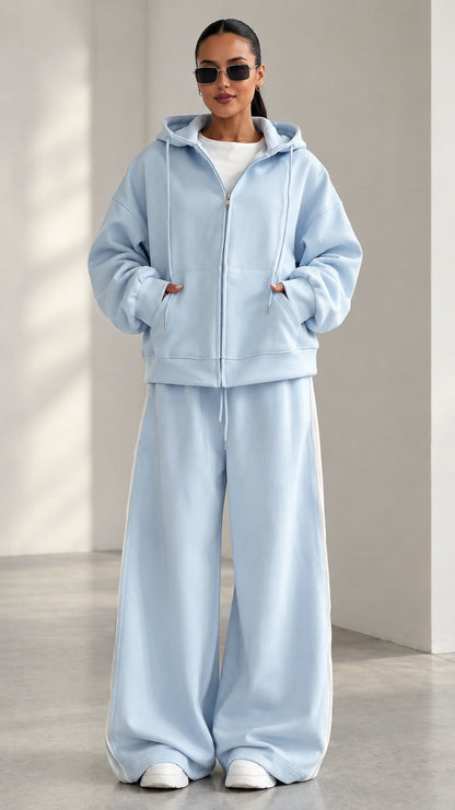 Full front view of model wearing Light Blue oversized zip hoodie and wide-leg sweatpants set