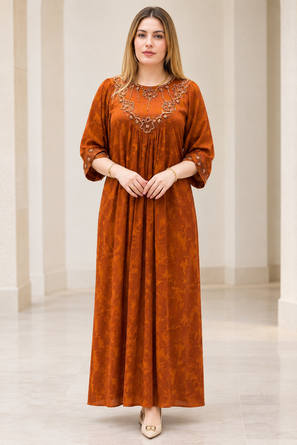 Front full view of woman wearing Rust Orange embroidered pleated maxi dress with 3/4 sleeves