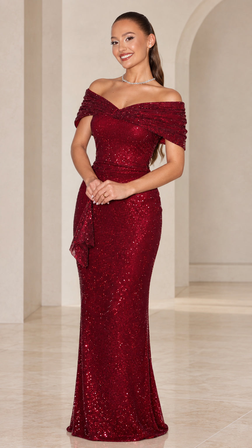 Front view of model wearing burgundy off-the-shoulder sequin floor-length evening gown