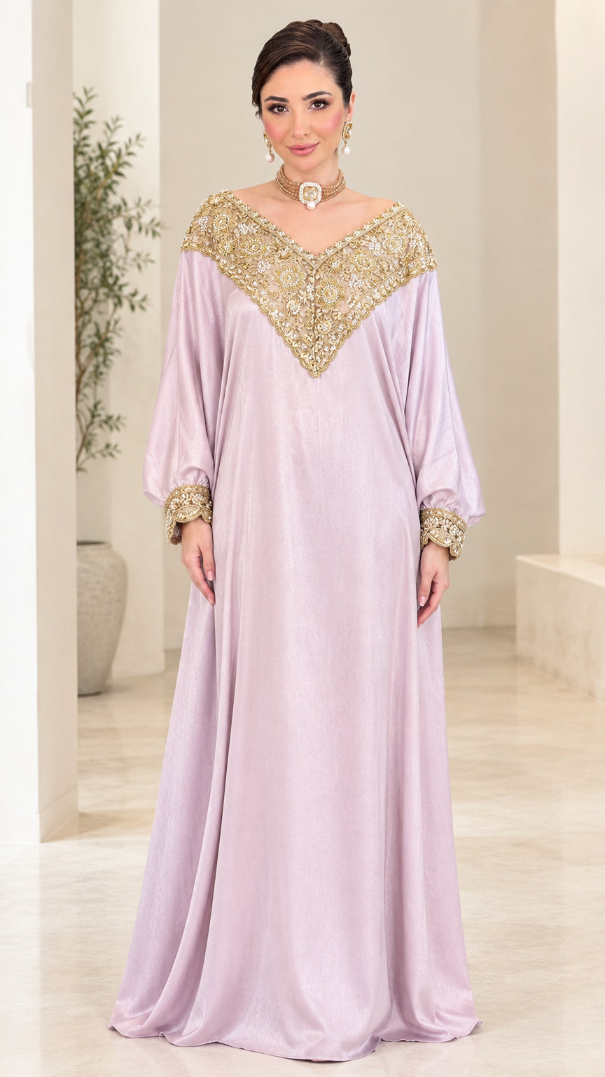 Front view of woman wearing lilac gold embroidered kaftan maxi dress
