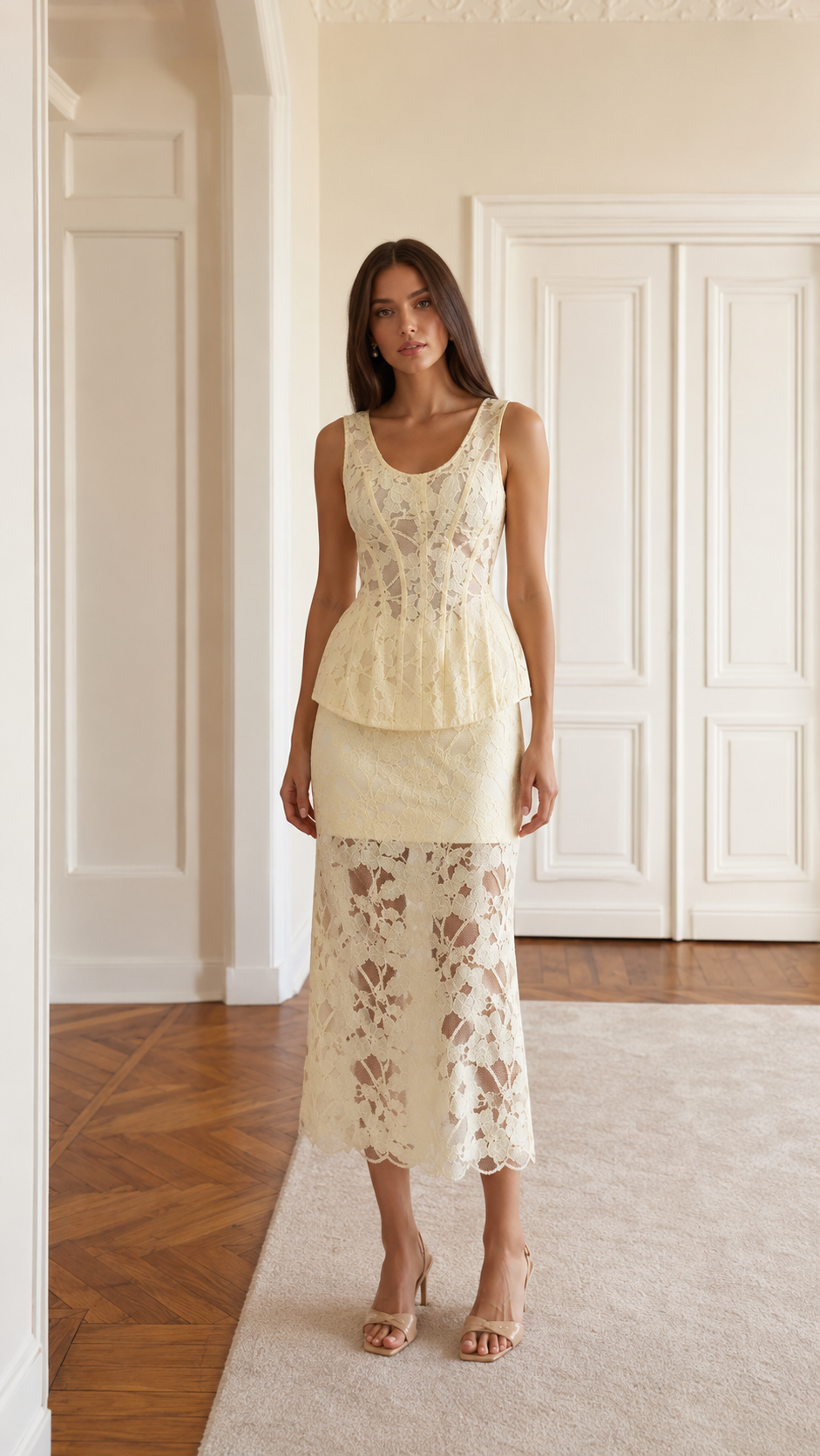 Front view of cream sleeveless lace peplum midi dress set with floral lace skirt hem