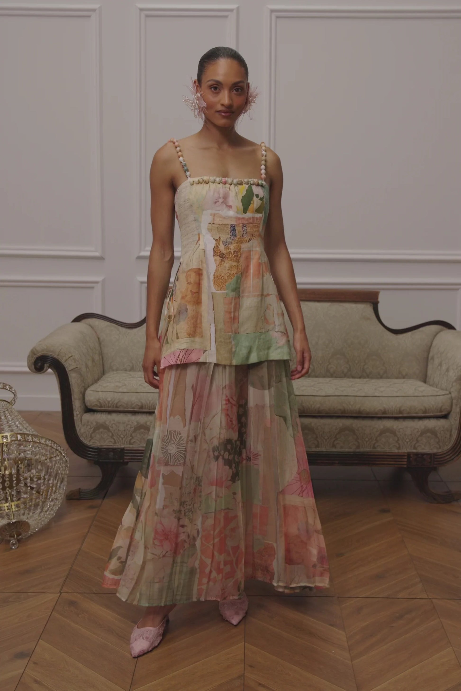 Front view of pastel floral patchwork maxi dress with beaded straps and flowing skirt
