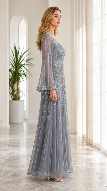 Side full-length view of model wearing dusty blue embellished formal maxi dress