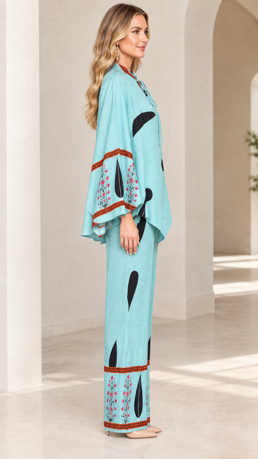 Side view of women's sky blue printed co-ord set showing flared sleeves