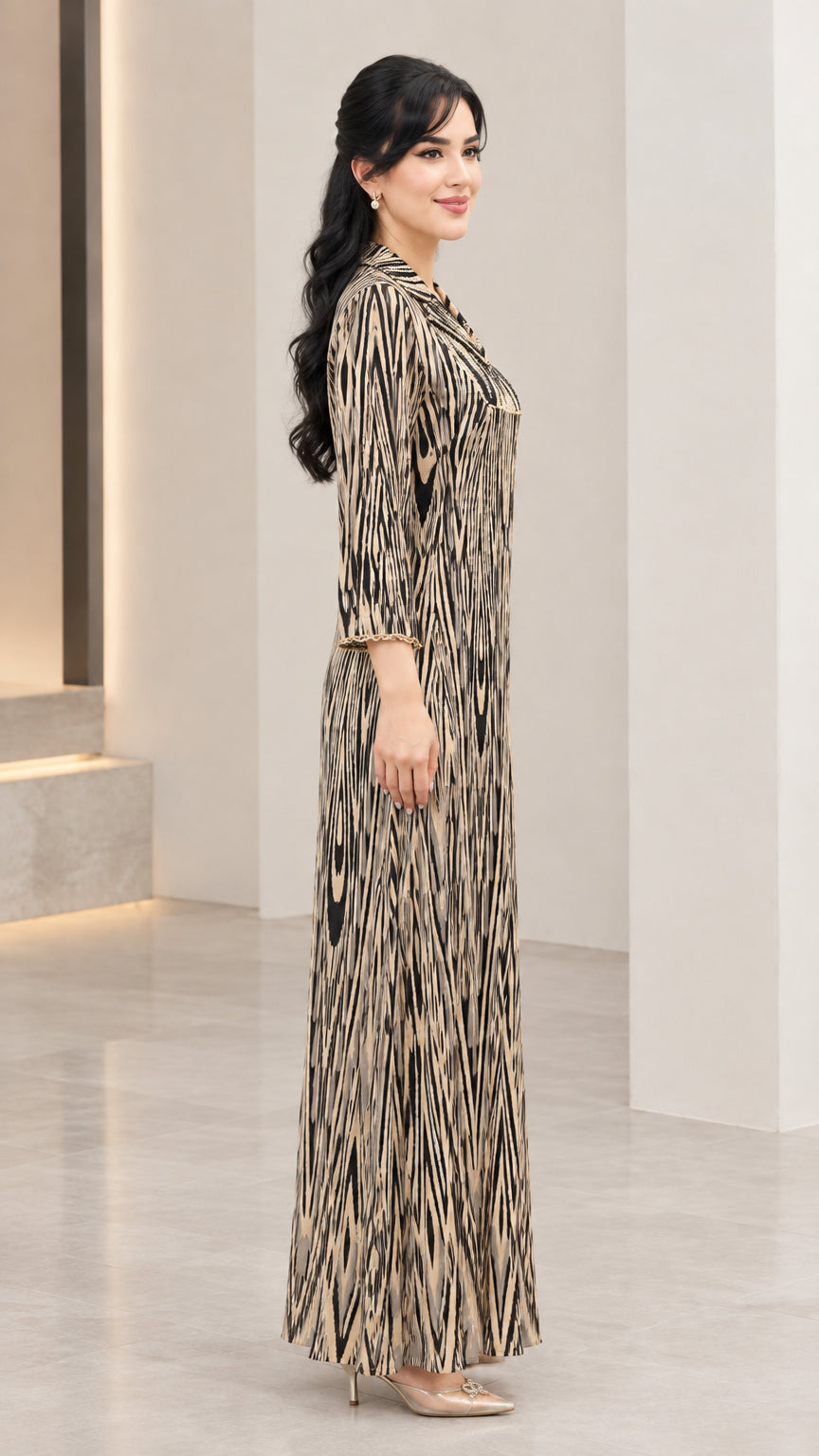 Side profile of champagne gold printed long sleeve maxi dress