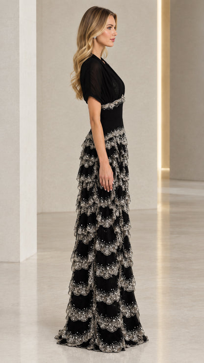 Side view of black tiered scalloped formal maxi dress