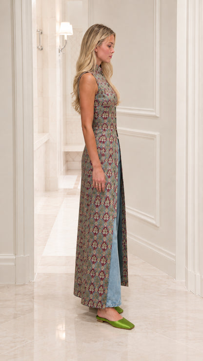 Side angle of model in sage green sleeveless jacquard longline tunic top