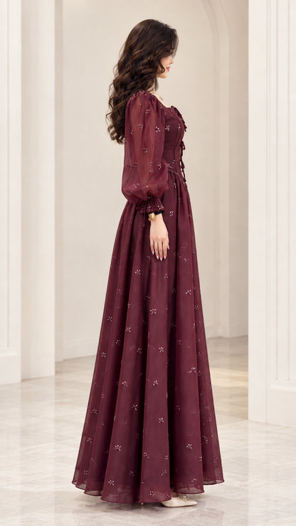 Side profile view of Wine Red lantern sleeve formal maxi dress