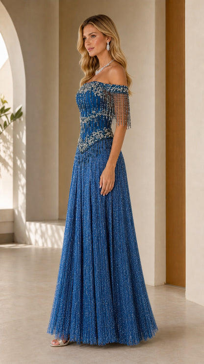 Side profile of model wearing royal blue shimmer pleated formal maxi dress