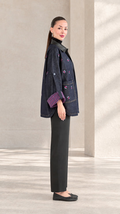 Side profile view of woman modeling Indigo Blue embroidered jacket with relaxed sleeves