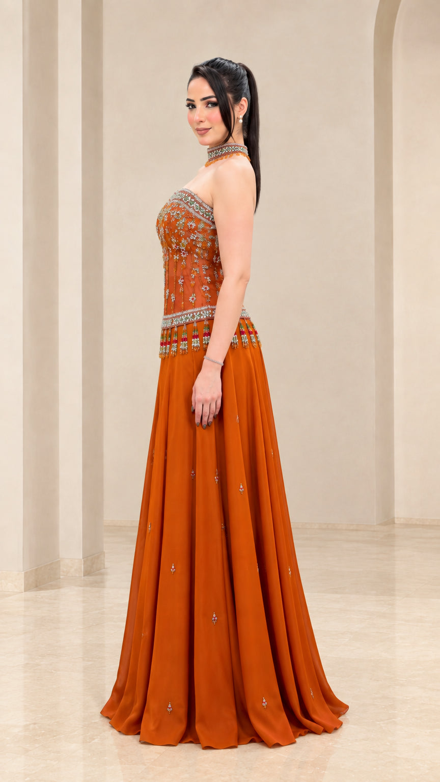 Rust orange formal evening dress with cape detail - side profile view