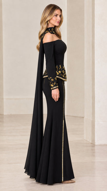 Side profile of black cape sleeve formal gown showing flowing sleeve drape