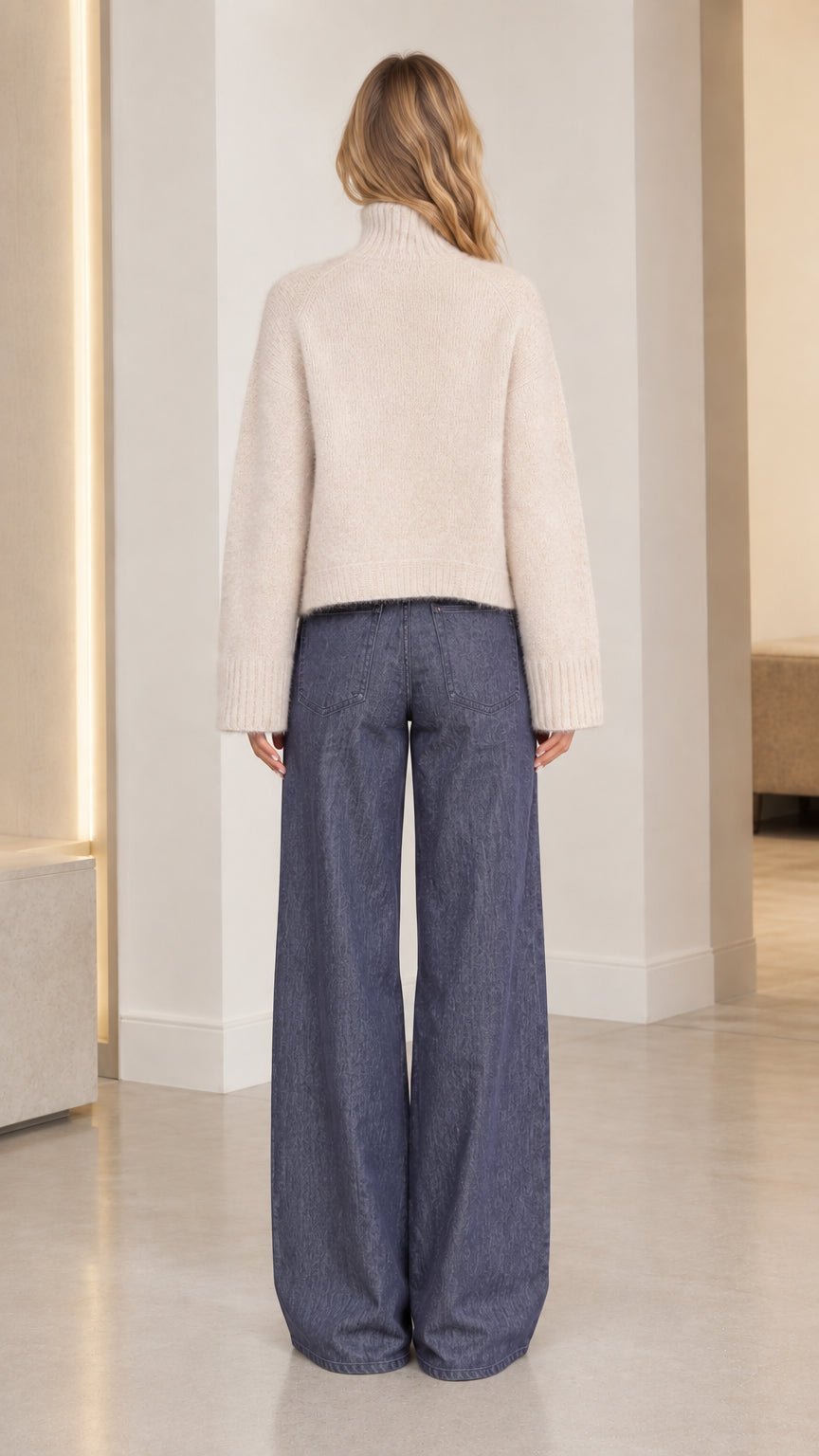 Back view of women's beige mock neck brushed knit sweater