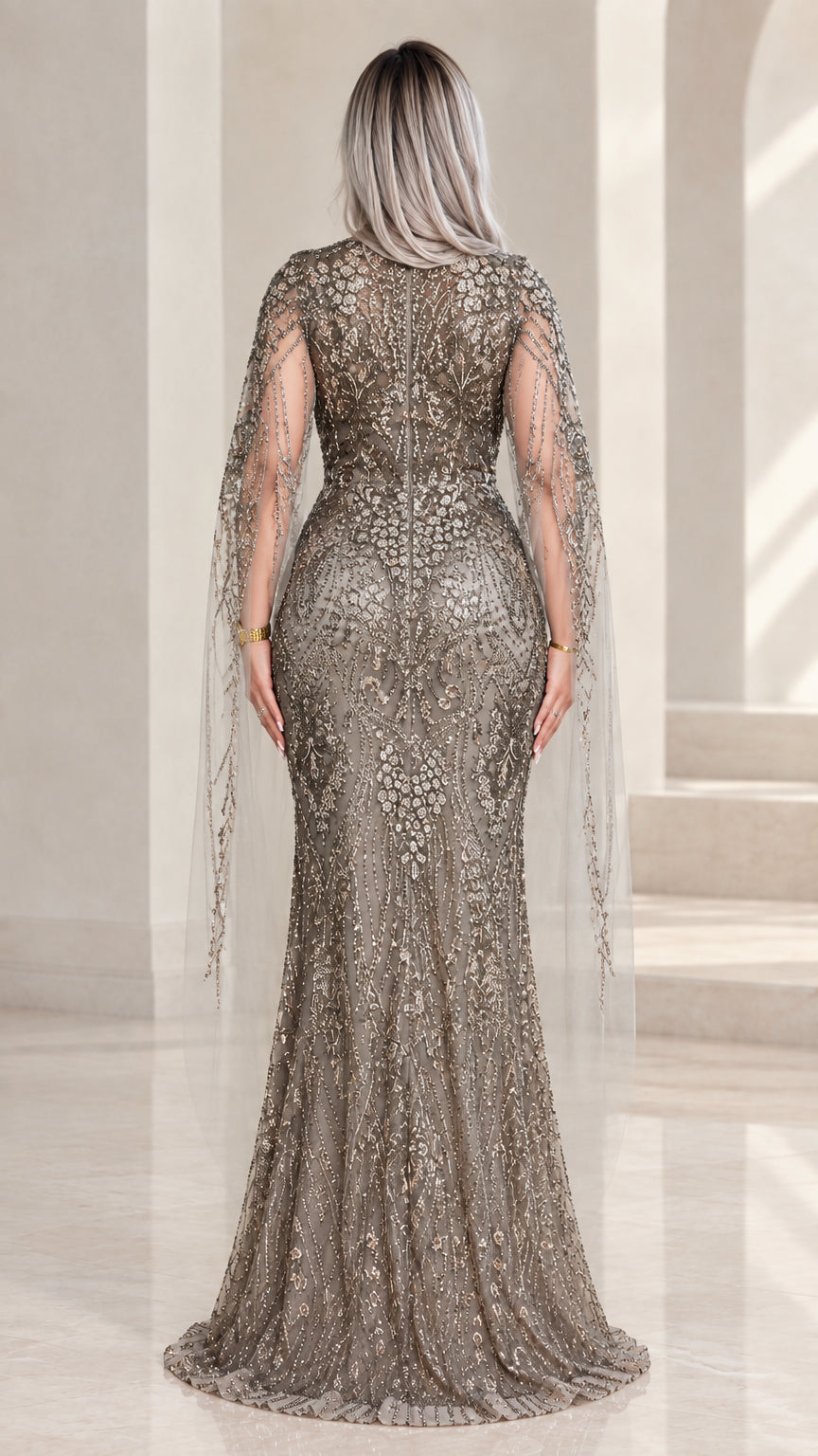 Back view of fitted grey embellished formal gown with back zipper
