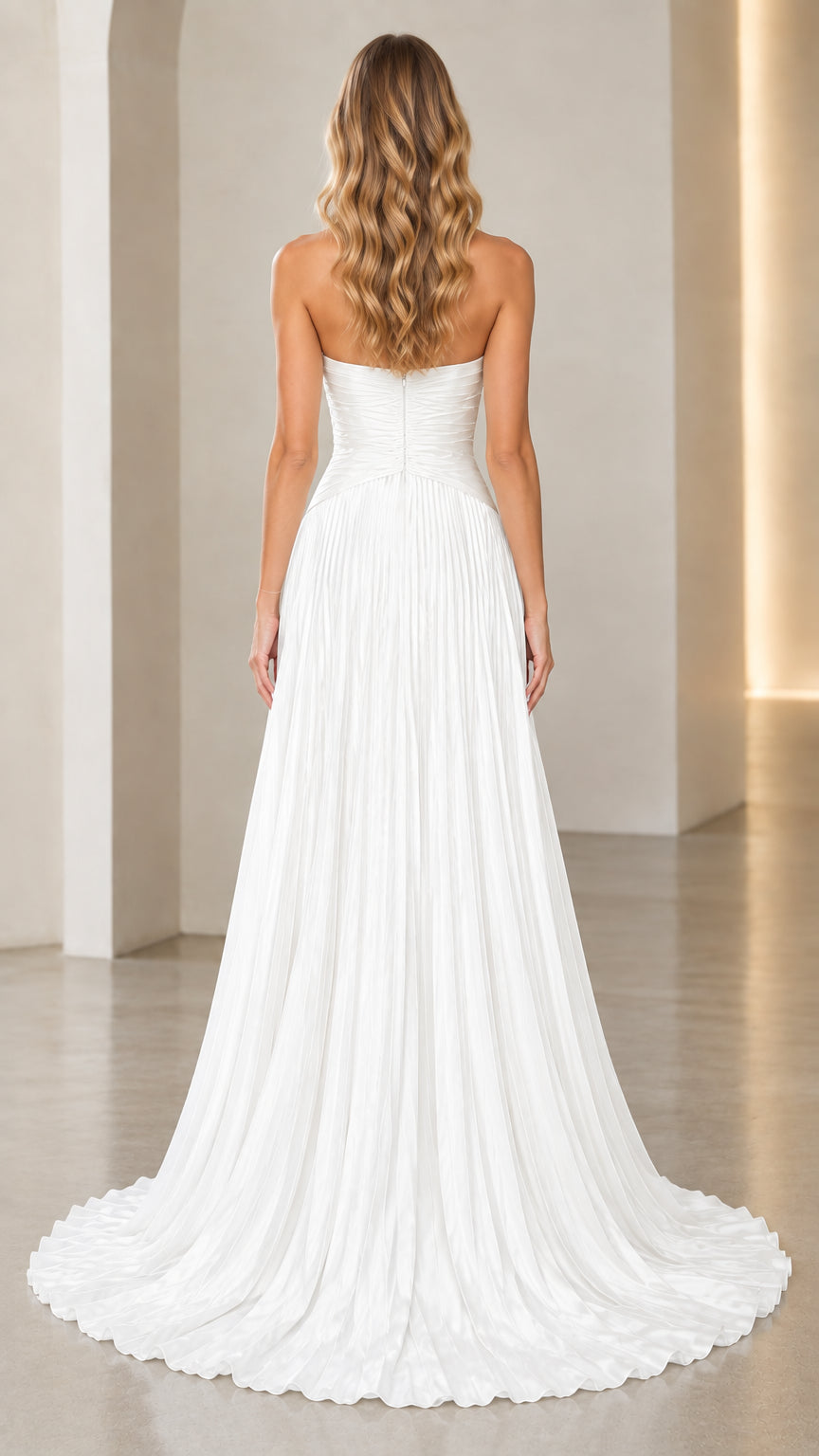 Back view of white strapless floor-length evening gown