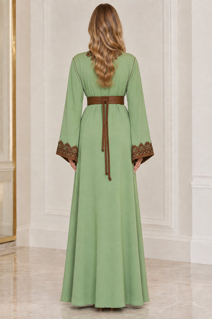 Back view of sage green caftan maxi dress showing tie belt