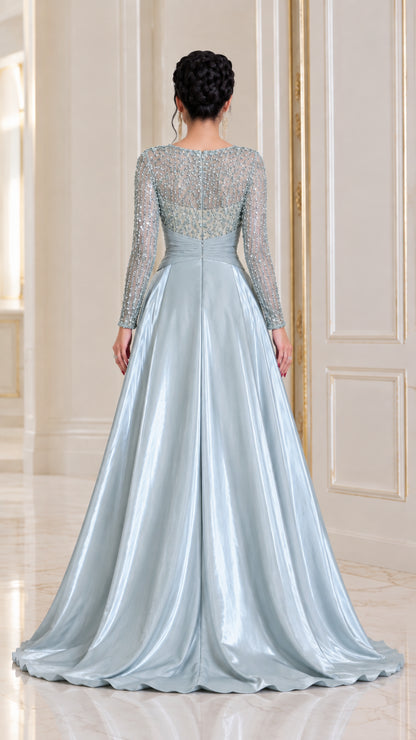 Back view of ice blue evening gown showing long sleeves and satin train
