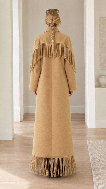 Back view of camel maxi coat highlighting fringed back yoke and hemline