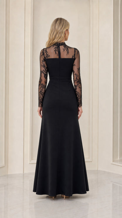 Back view of black long sleeve evening gown showing sheer lace upper panel