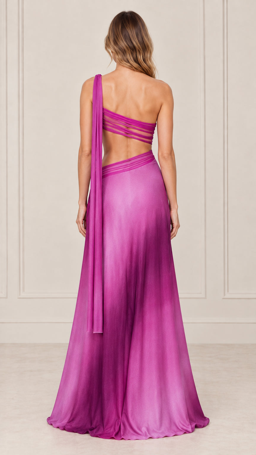 Back view of magenta ombre one-shoulder dress showing strappy back cutout and long shoulder sash