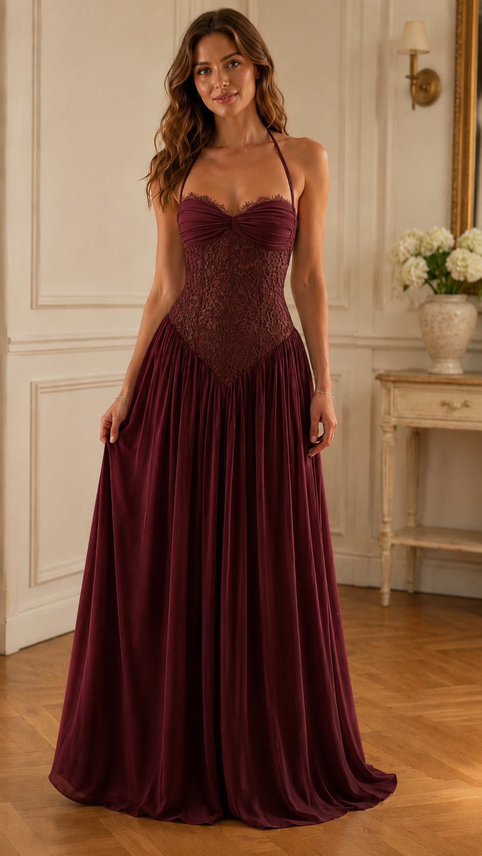 Front view of burgundy halter maxi dress with lace bodice and floor-length drape