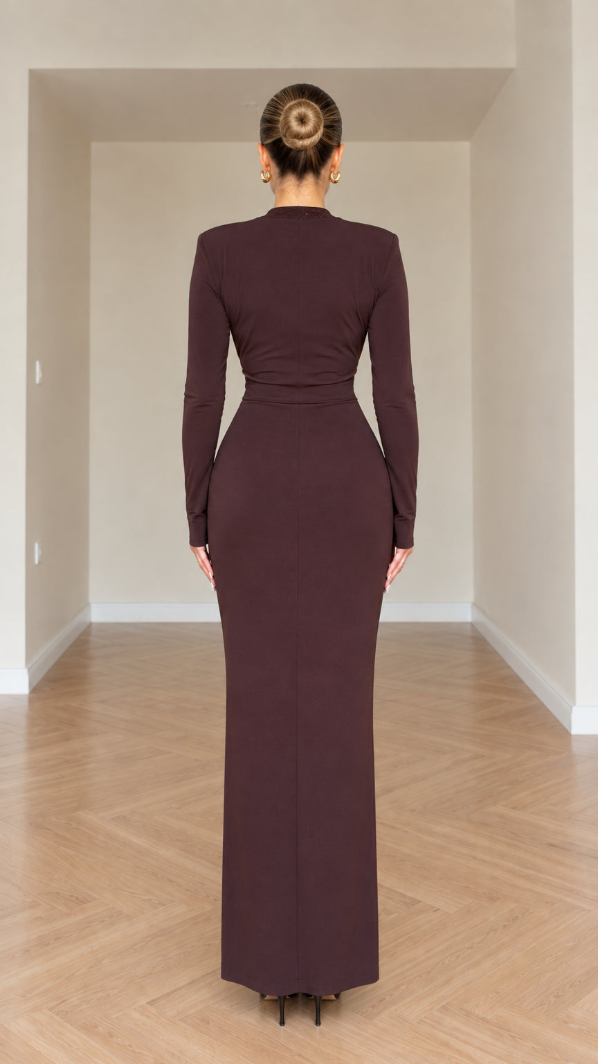 Back view of chocolate brown formal maxi dress showing clean silhouette