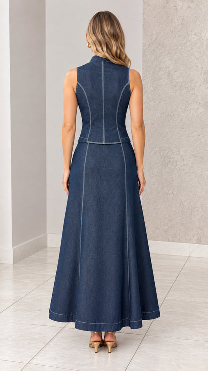 Back full-length view of dark blue tailored vest and maxi skirt set showing contrast seams