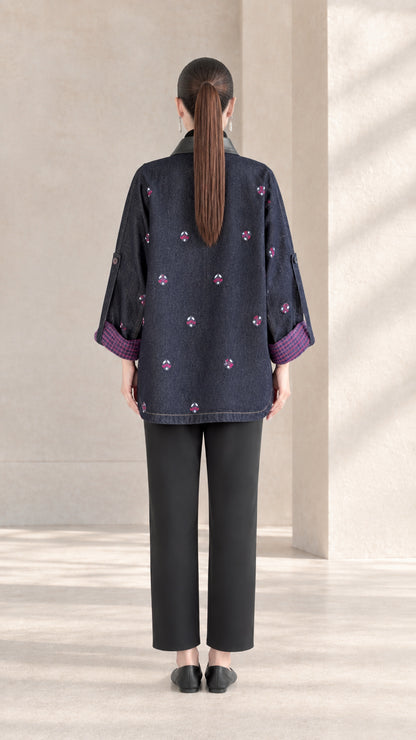 Back view of Indigo Blue embroidered jacket showing high-low curved hemline
