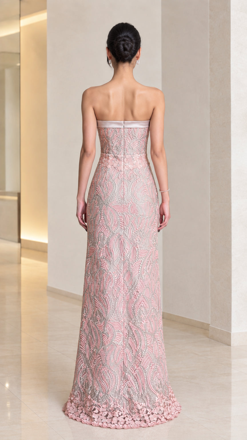 Blush pink strapless column gown back view showing back zipper