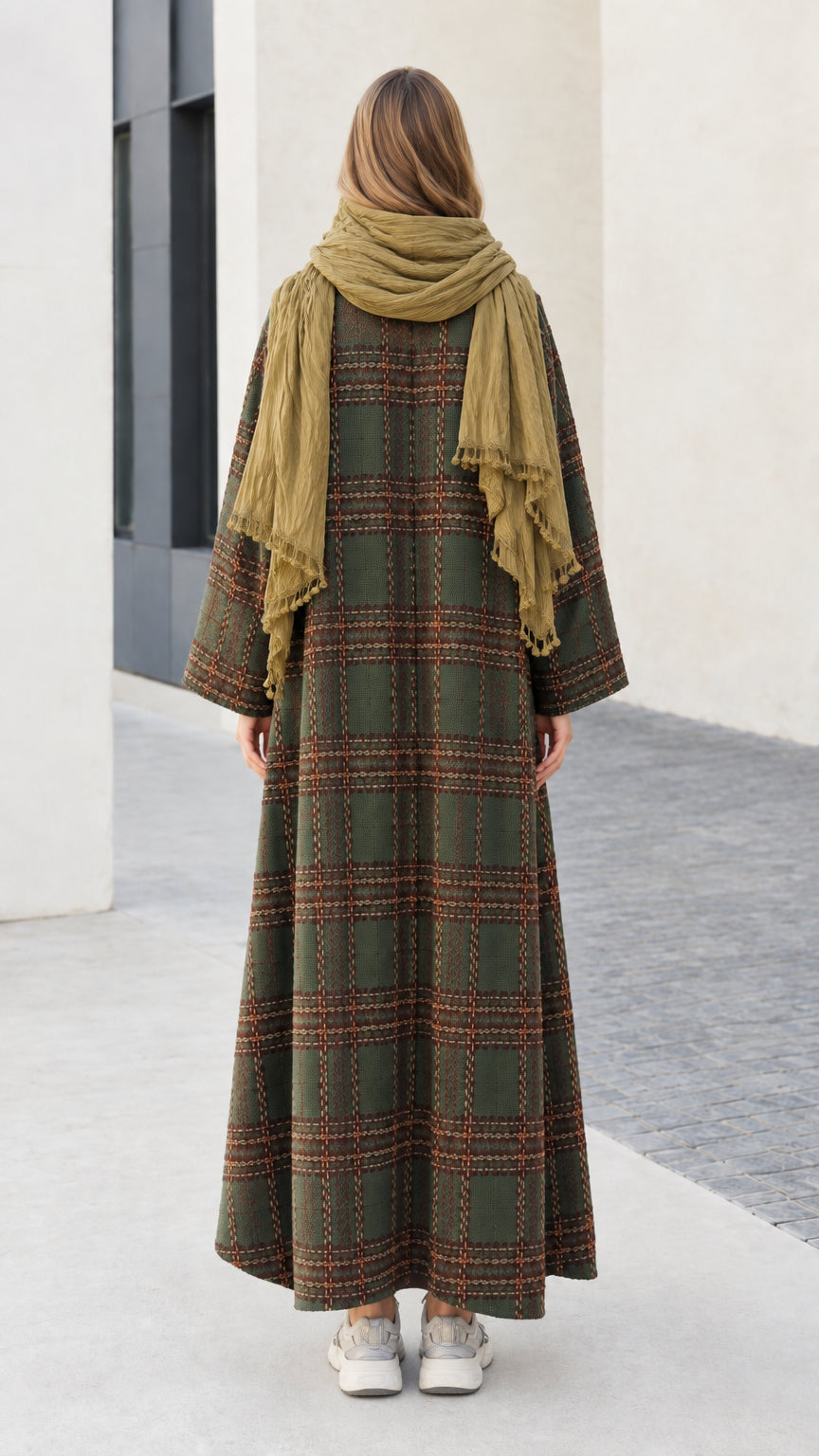Back view of full length olive green check duster coat