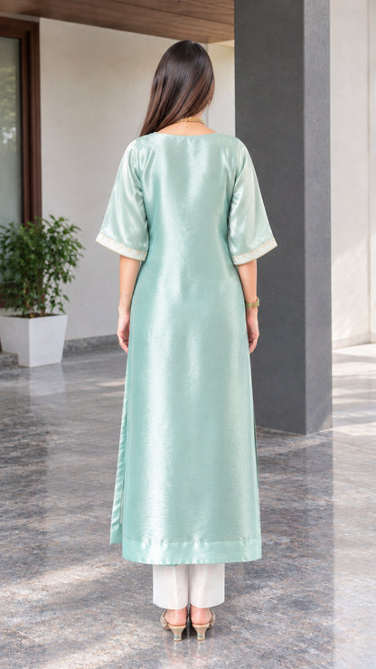 Back view of woman modeling sage green straight tunic kurta