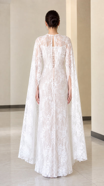 White lace formal dress with cape, back view