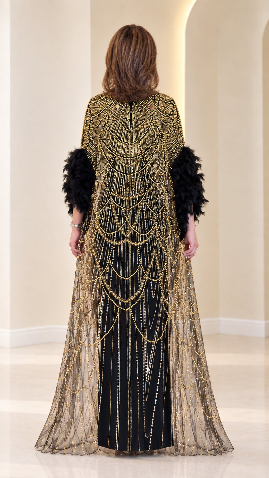 Back view of black beaded cape evening maxi dress