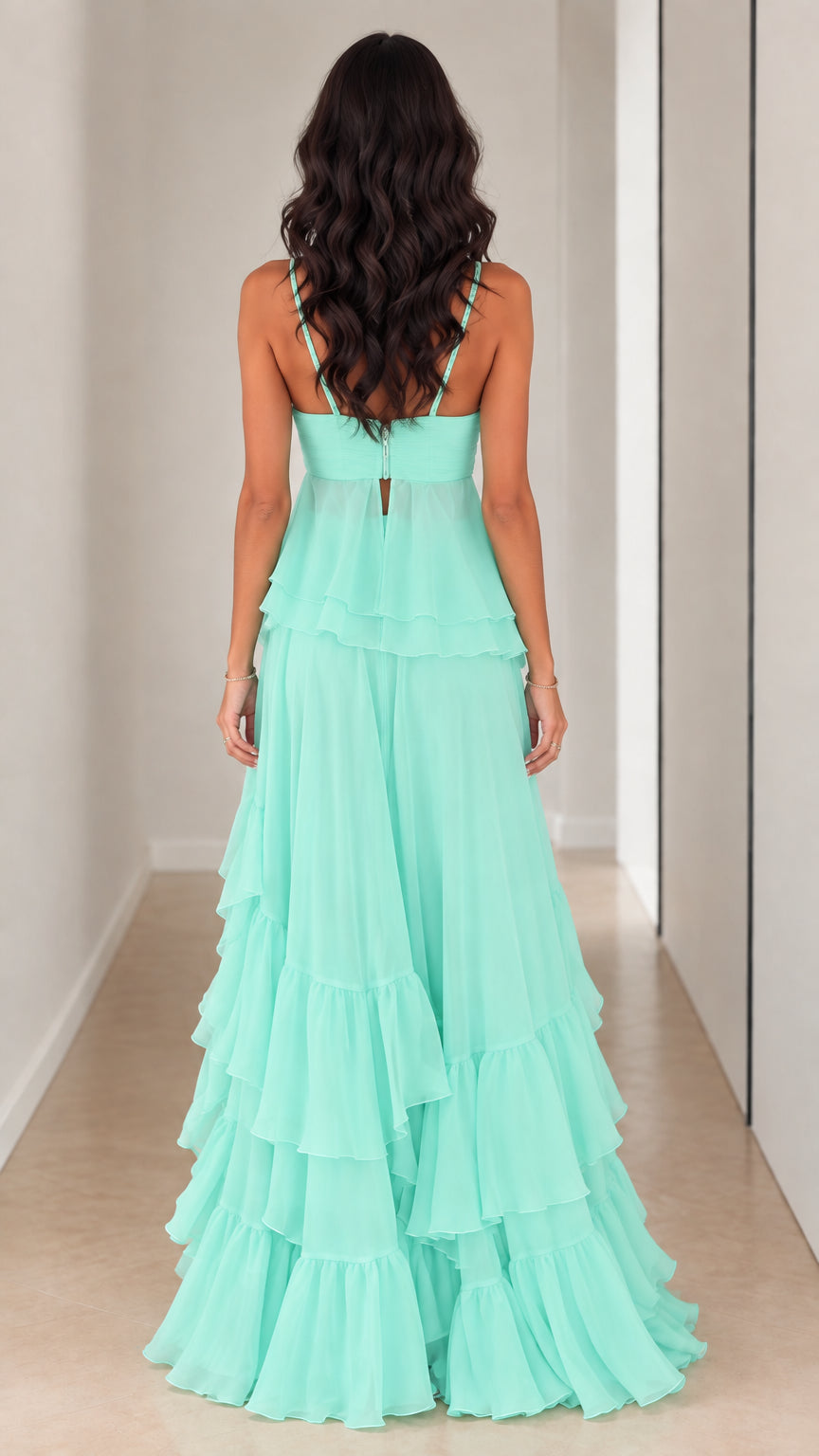 Back view of model showing back zip closure on Mint Green chiffon tiered gown
