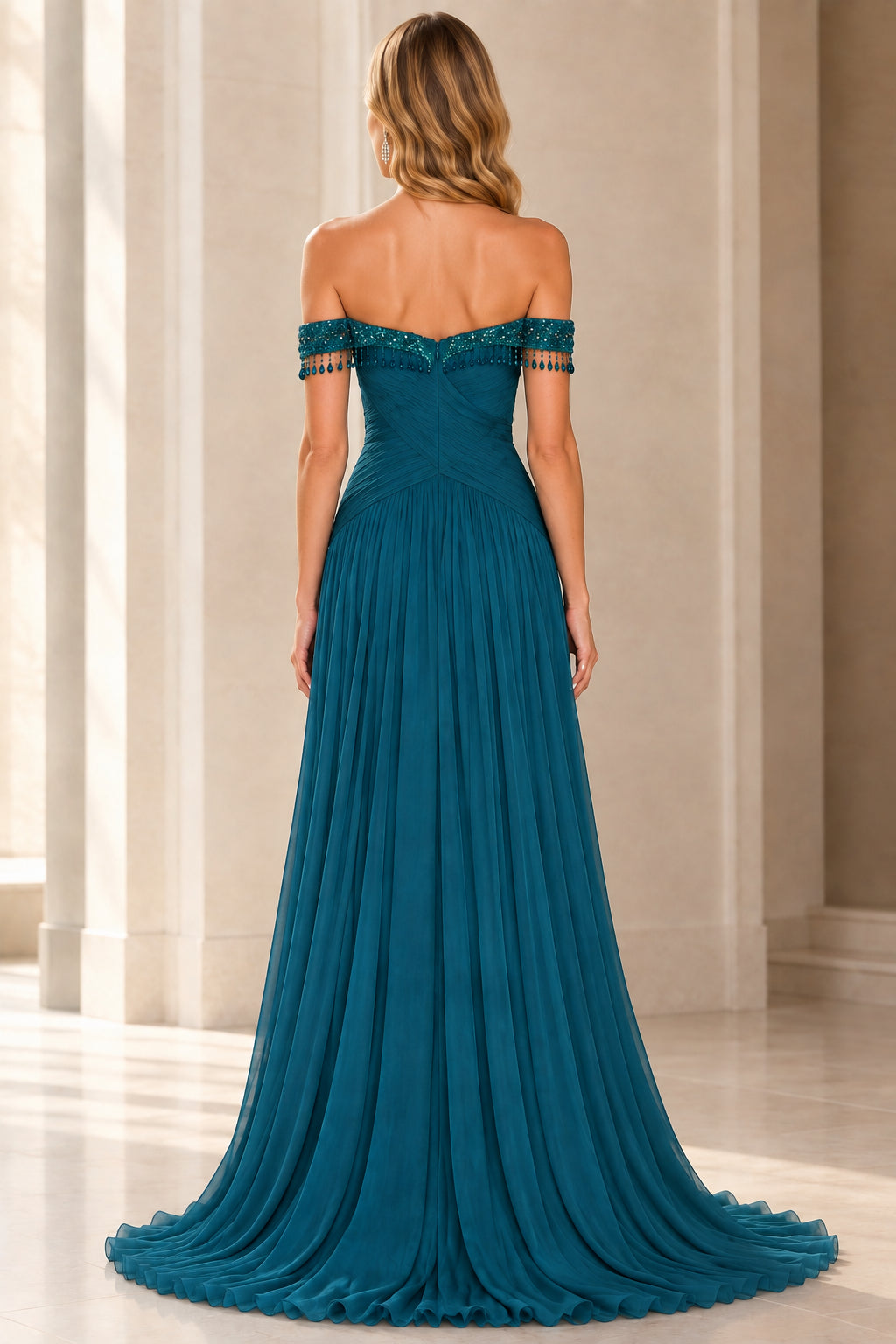 Back view of peacock blue pleated evening gown showing off-the-shoulder strap details