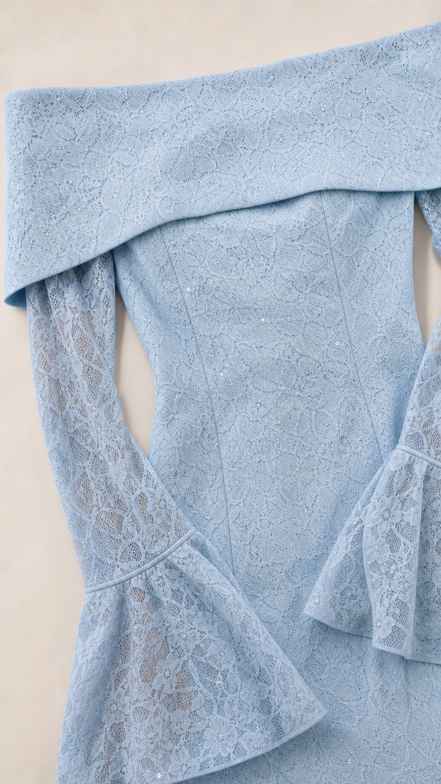 Close-up detail of Light Blue floral lace texture and fold-over neckline