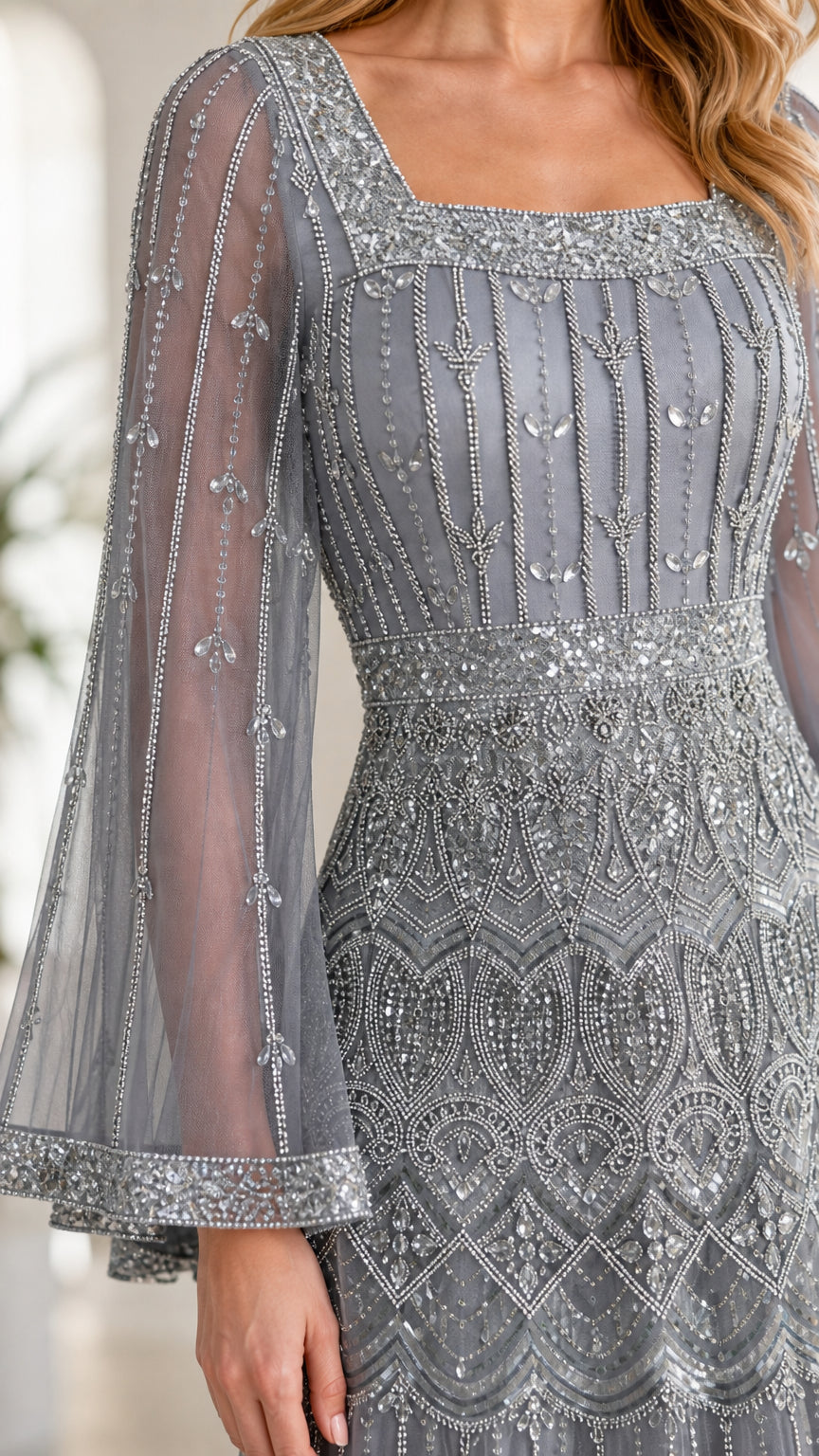 Close-up detail of intricate beadwork, sequins, square neckline, and flared mesh sleeve