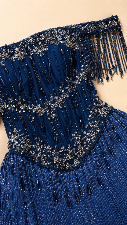 Close-up detail of Royal Blue sequined bodice and hanging beaded fringe