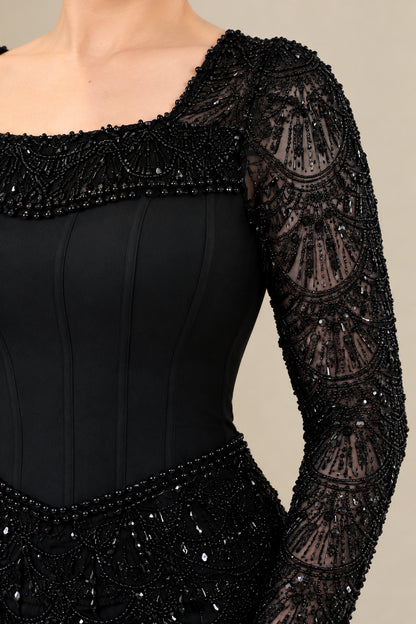 Close-up detail of beaded neckline, structured corset bodice, and sequined sleeve