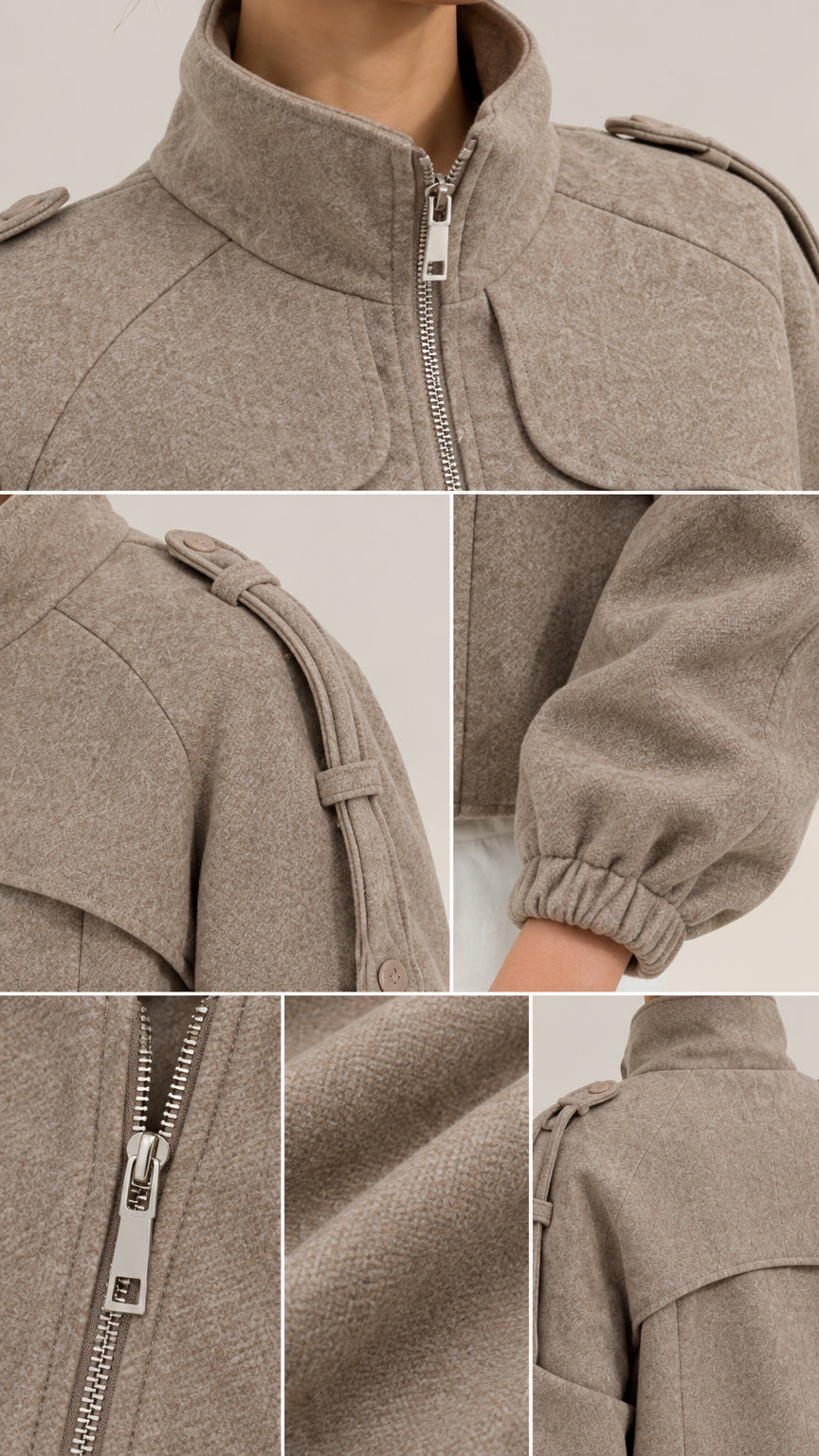 Close-up details of taupe utility jacket showing zip pull, shoulder straps, fabric texture, and elastic cuffs