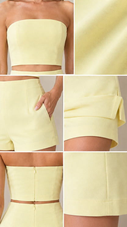Detailed close-up shots of pale yellow crop top fabric, shorts pocket, and layered hem tailoring