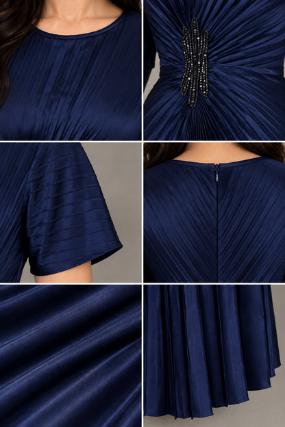 Close-up details of neckline, beaded waist embellishment, short sleeve, and pleated fabric