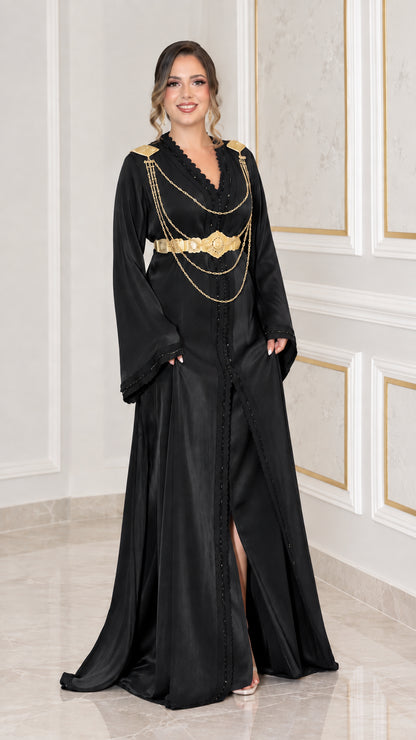 Black satin kaftan maxi dress with ornate gold belt and shoulder chain embellishments
