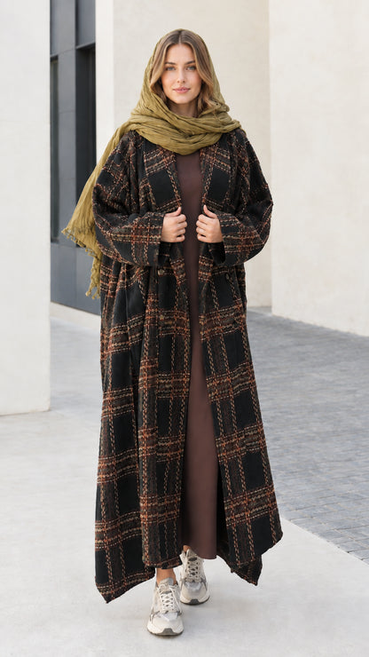 Full length view of black plaid open front maxi duster coat