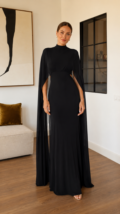 Front view of black mock neck cape sleeve maxi evening dress