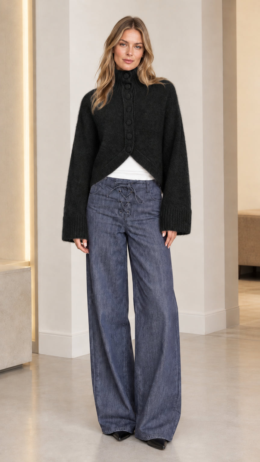 Women's black high neck fuzzy knit cardigan with covered buttons and split hem