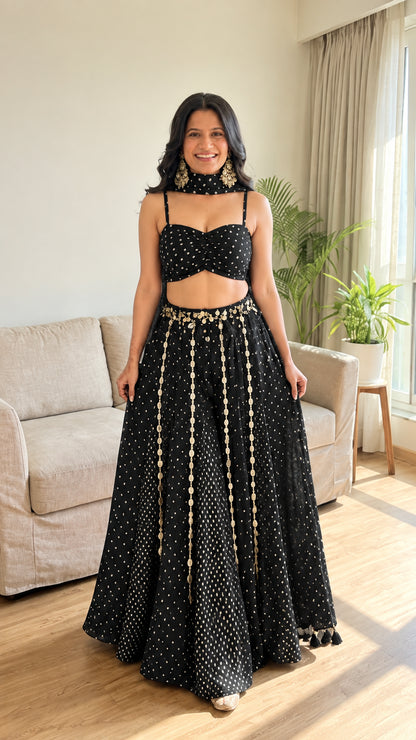 Black bandhani print bustier and flared maxi lehenga set