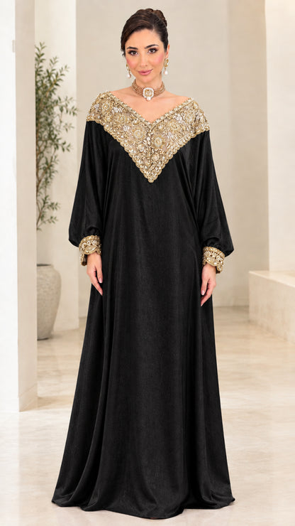 Front view of black kaftan maxi dress with gold embroidered neckline